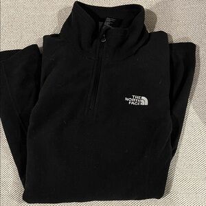 The North Face women’s  Black Zip-Up fleece. Size medium.
